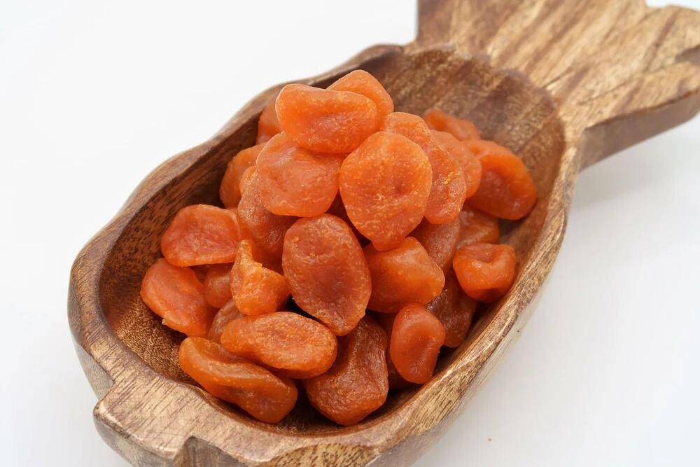 A tiny citrus fruit with a sweet and tart flavor, typically eaten whole, skin and all