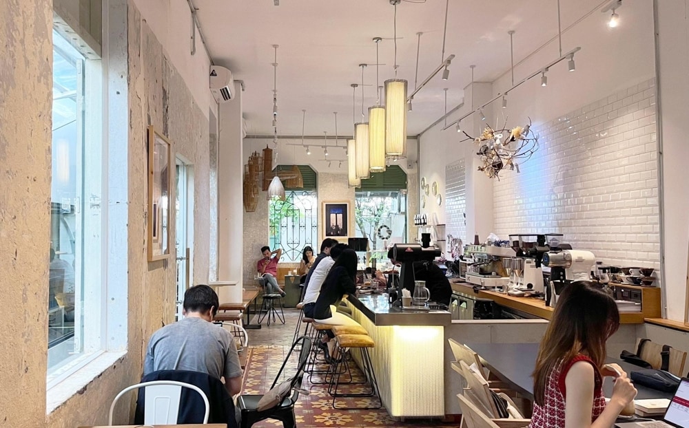 A minimalist café serving precision brews in a serene setting