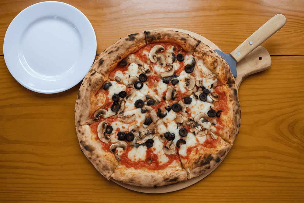 Pizza Belga offers Belgian-style pizza with rich toppings and a unique hearty crust