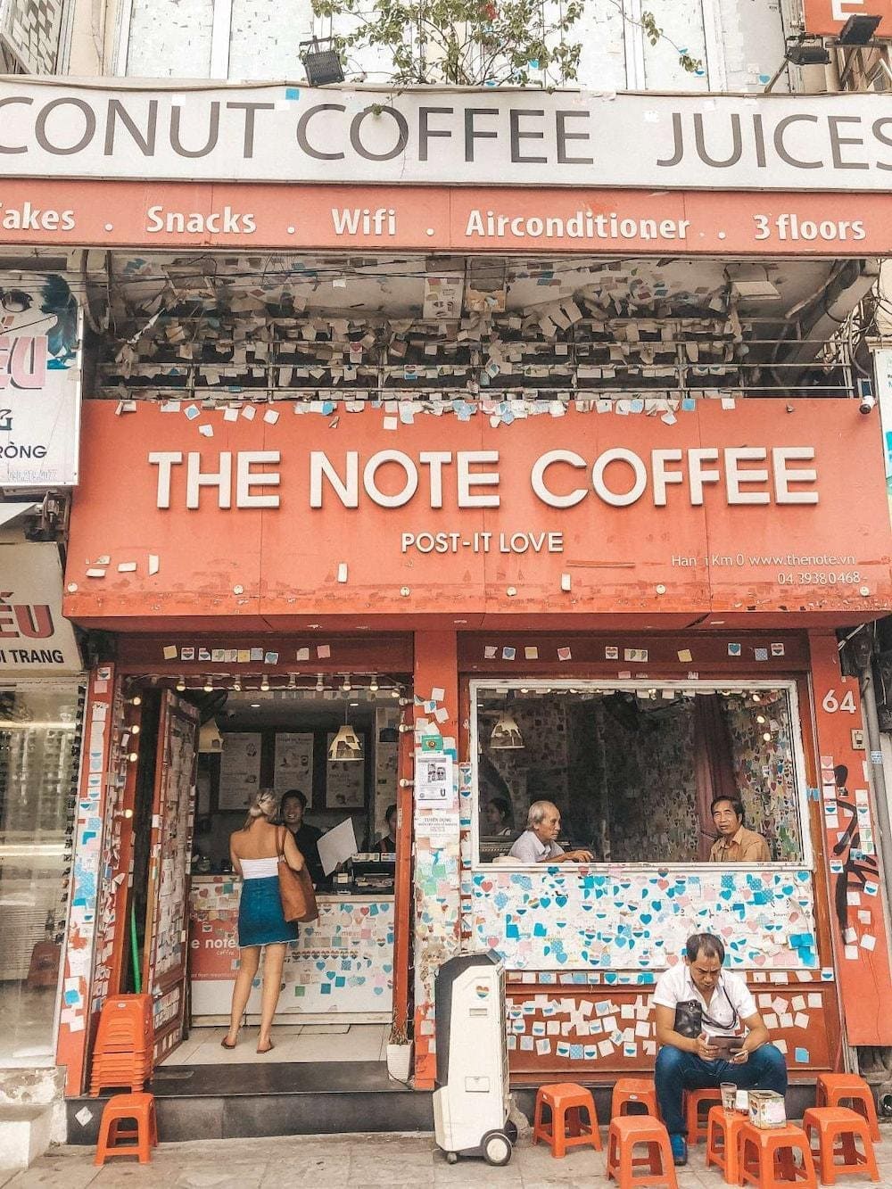 A cozy spot filled with handwritten notes from around the world, serving sweet and mild coconut coffee