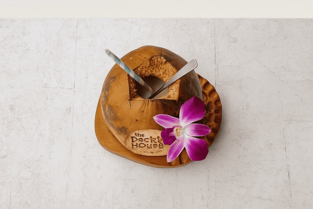 Don’t miss the chilled coconut water engraved with “The Deck House”, refreshing and picture-perfect for your beachside snapshots