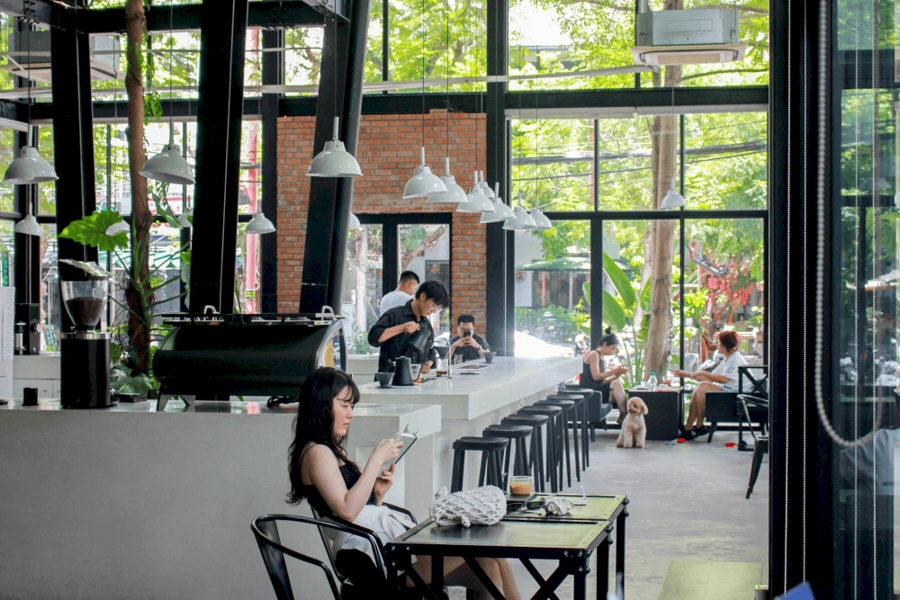 XLIII Specialty Coffee is where you find minimalism and beauty from nature with greenery and abundant natural light (Source: XLIII Coffee)