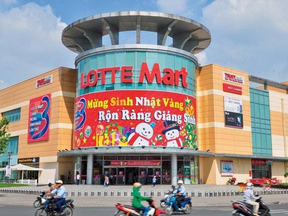 Families shopping and dining at the modern Lotte Mart shopping mall