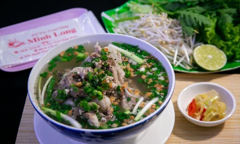 A bowl of noodles with full toppings that appeals to food lovers