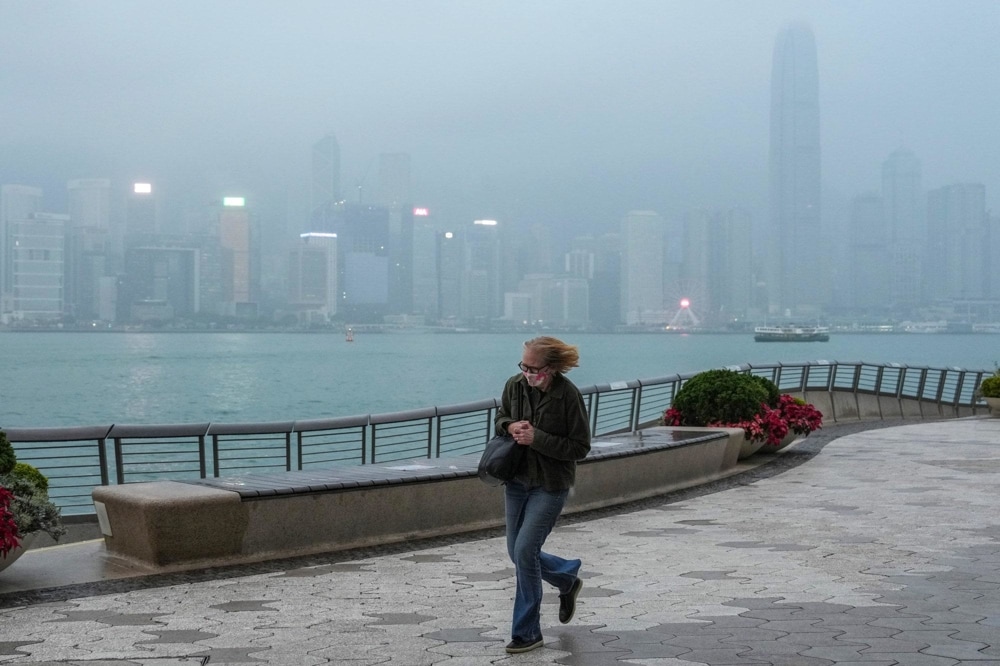 Locals bundle up as 16–20°C feels chilly in Hong Kong's humid winter