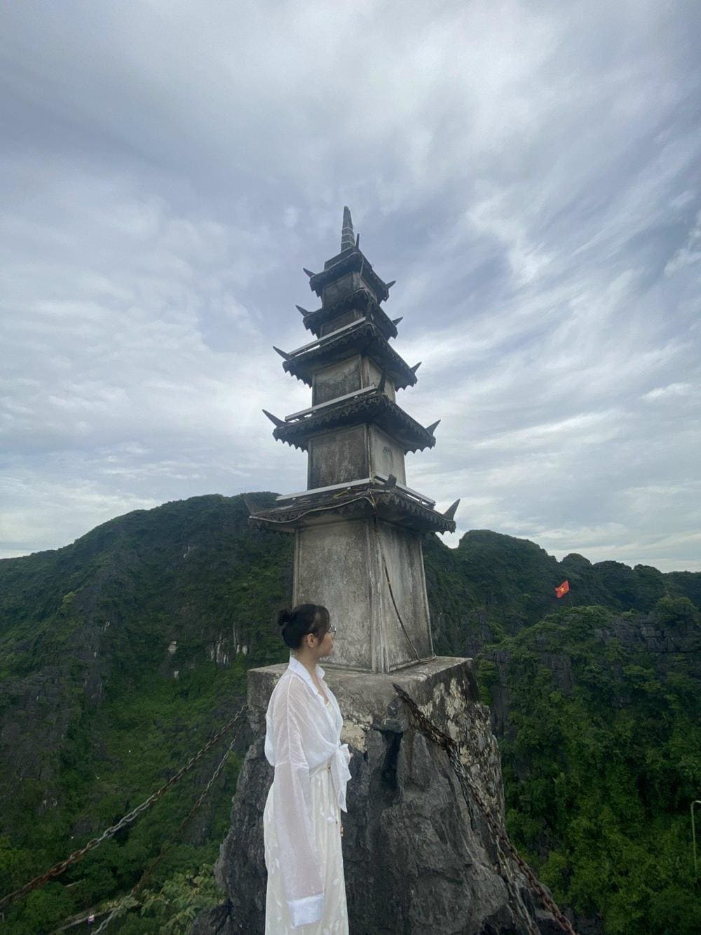 As you ascend the mountain, spiritual sanctuaries nestled in the rocks invite quiet reflection and a deeper connection to the land