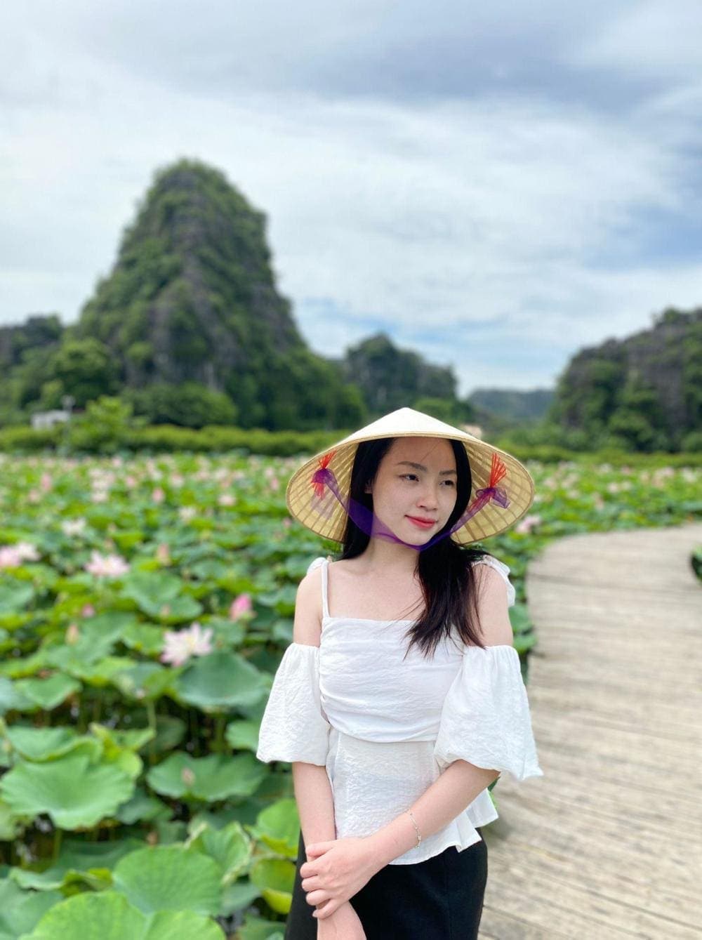 Tourists are capturing the serene beauty of the Lotus Pond