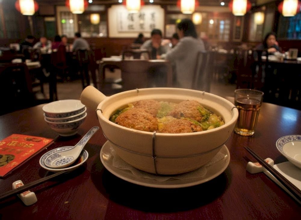 Shīzi Tóu is a dish with large meatballs cooked in a light broth