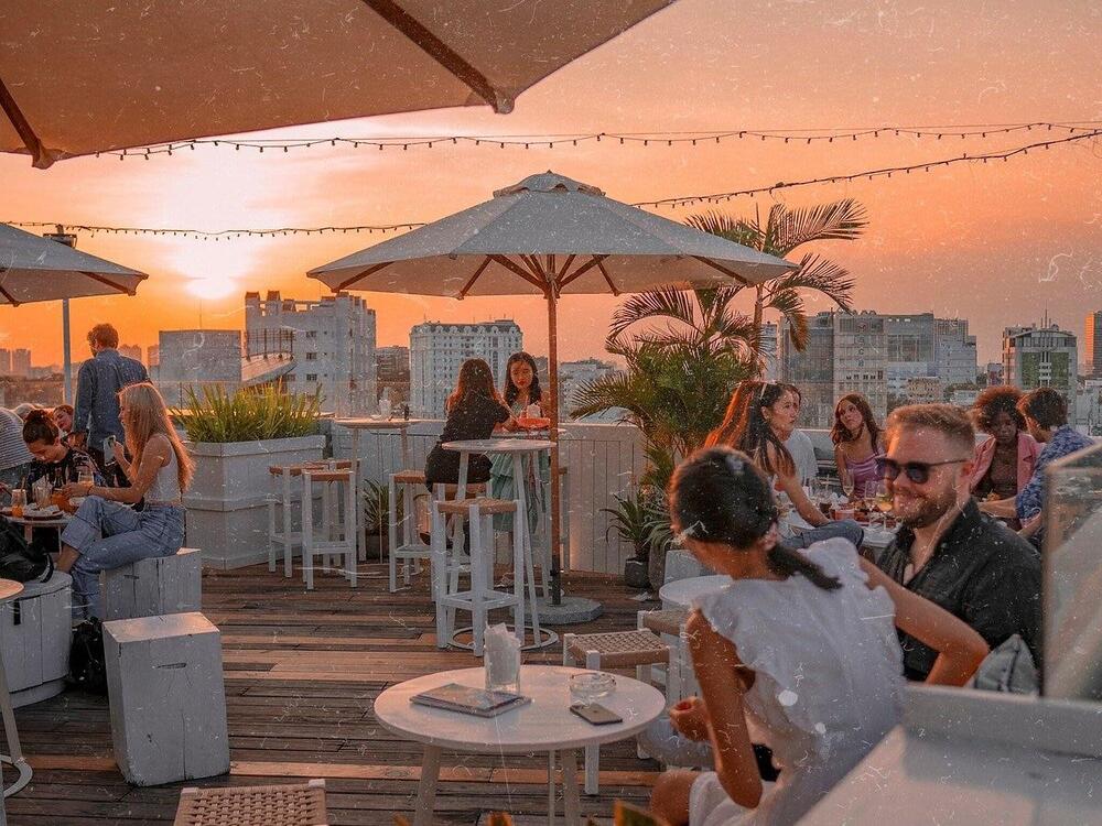 A rooftop bistro serving delicious French-Vietnamese fusion dishes with stunning views of the city skyline