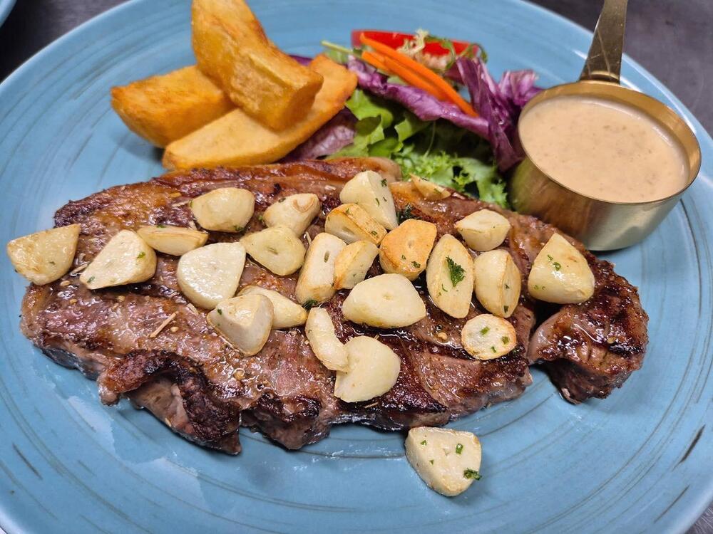 An Indochine-inspired French bistro offering a wide variety of gourmet dishes with a Parisian touch in a cozy setting