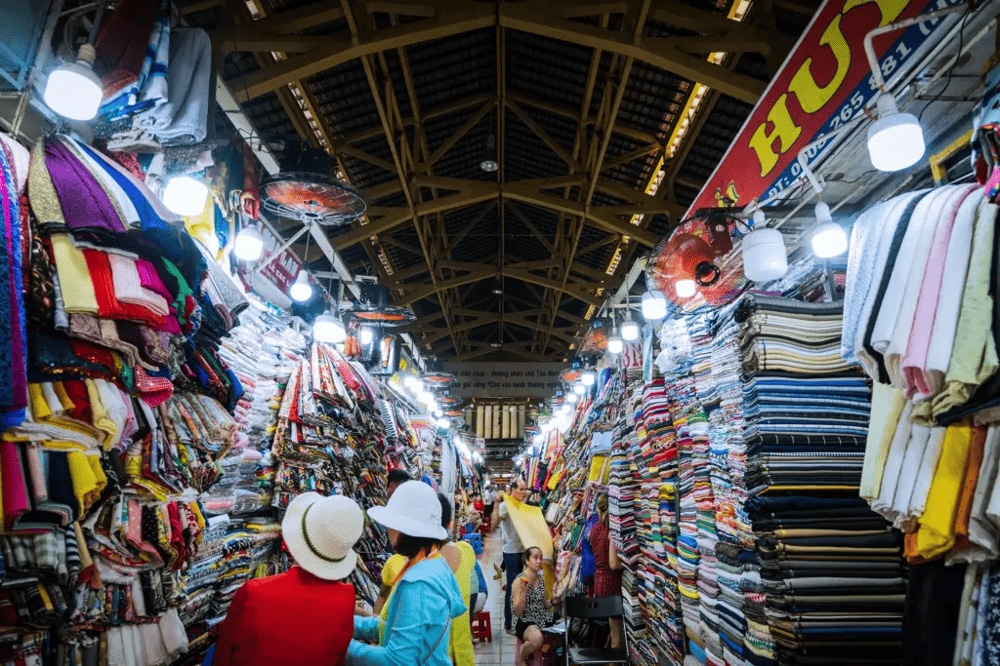 Tan Dinh Market is a true local experience, known for its diverse selection of fabrics (Source: Jackfruit Adventure)