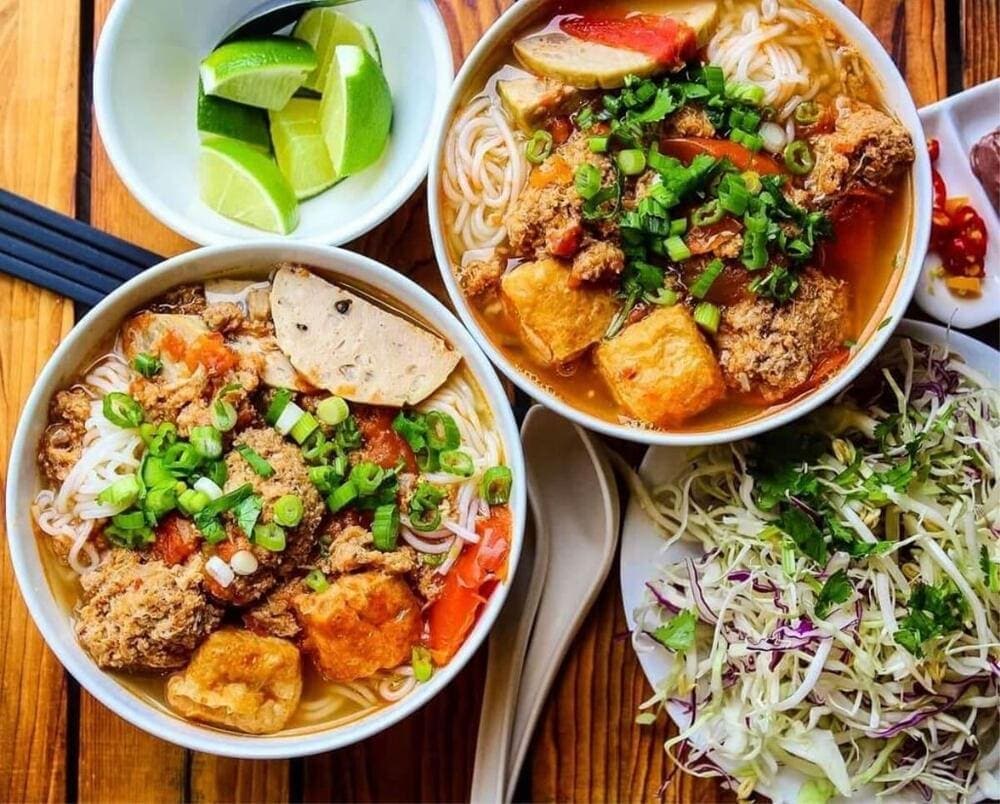 Bun Rieu is a tangy crab noodle soup popular for its rich flavor