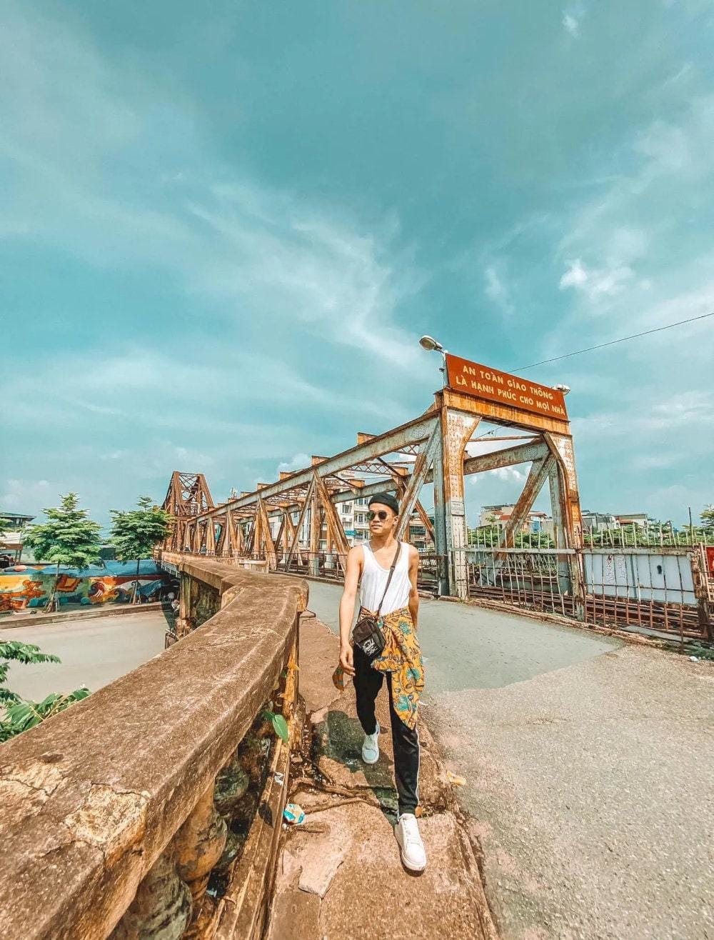 You can take photos of the entire bridge or with the Red River