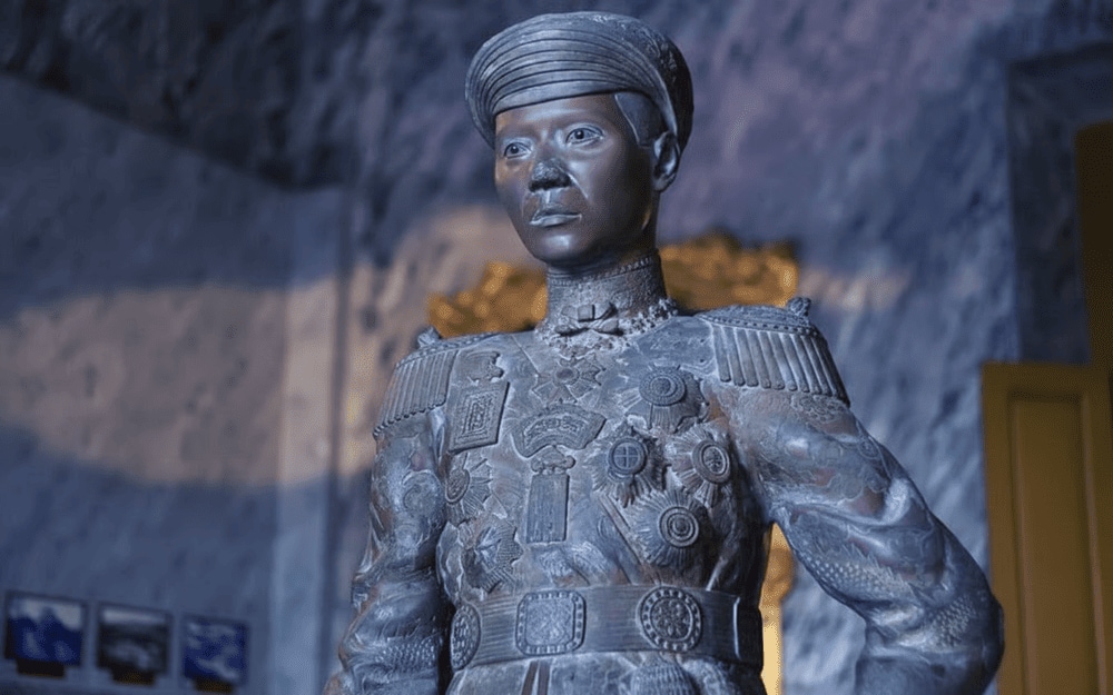 The statue captures the emperor in regal attire, embodying his authority