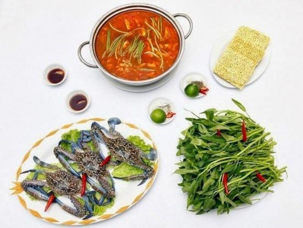 Morning glory hotpot with crab is a coastal favorite in vietnam’s seaside cities