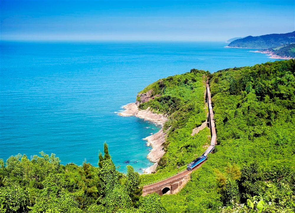 The route to Nha Trang, Phan Thiet, or Da Nang offers views of Vietnam’s southern coastline, with glimpses of palm-lined beaches, rural villages, and sunrise over the sea (Source: Fanpage of Vietnam Railway)