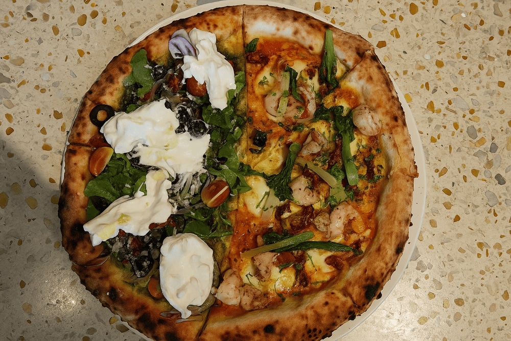 Wood-fired pizza oven at Pizza 4P's creating authentic Italian flavors with Japanese precision