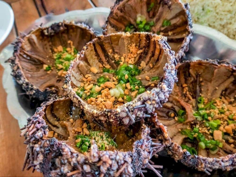 Grilled sea urchin is a must-try local delicacy