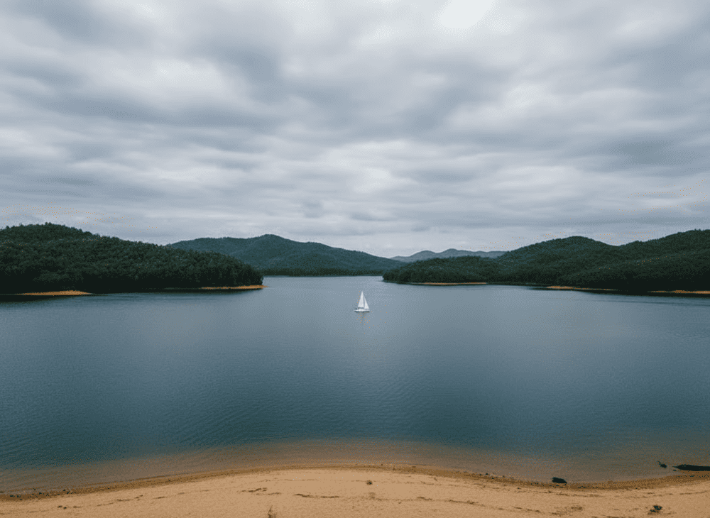 A tranquil island rises from the misty waters of Thac Ba Lake