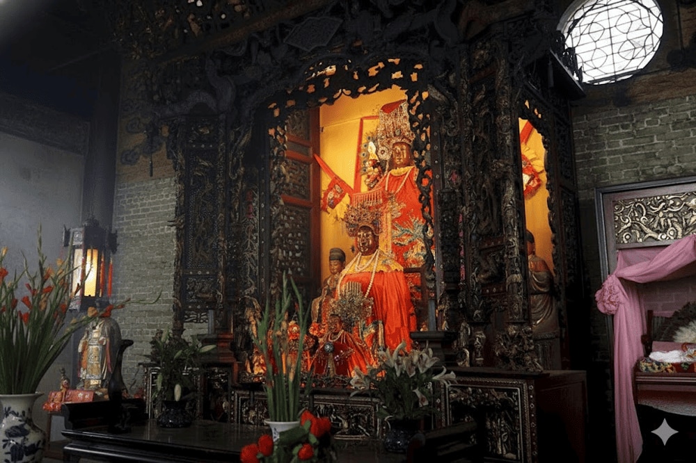 The 1-meter-tall wooden statue of Thien Hau, the sacred heart of the entire Temple