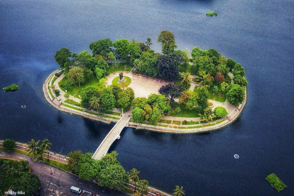 The small island amidst Bay Mau Lake in Thong Nhat Park from above
