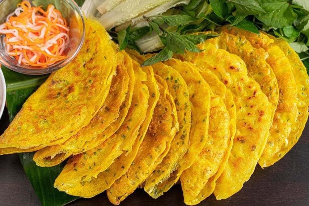 Golden crispy pancake filled with shrimp and bean sprouts