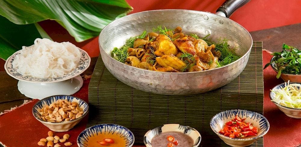 Cha ca La Vong is always served with dills, fresh herbs and shrimp paste