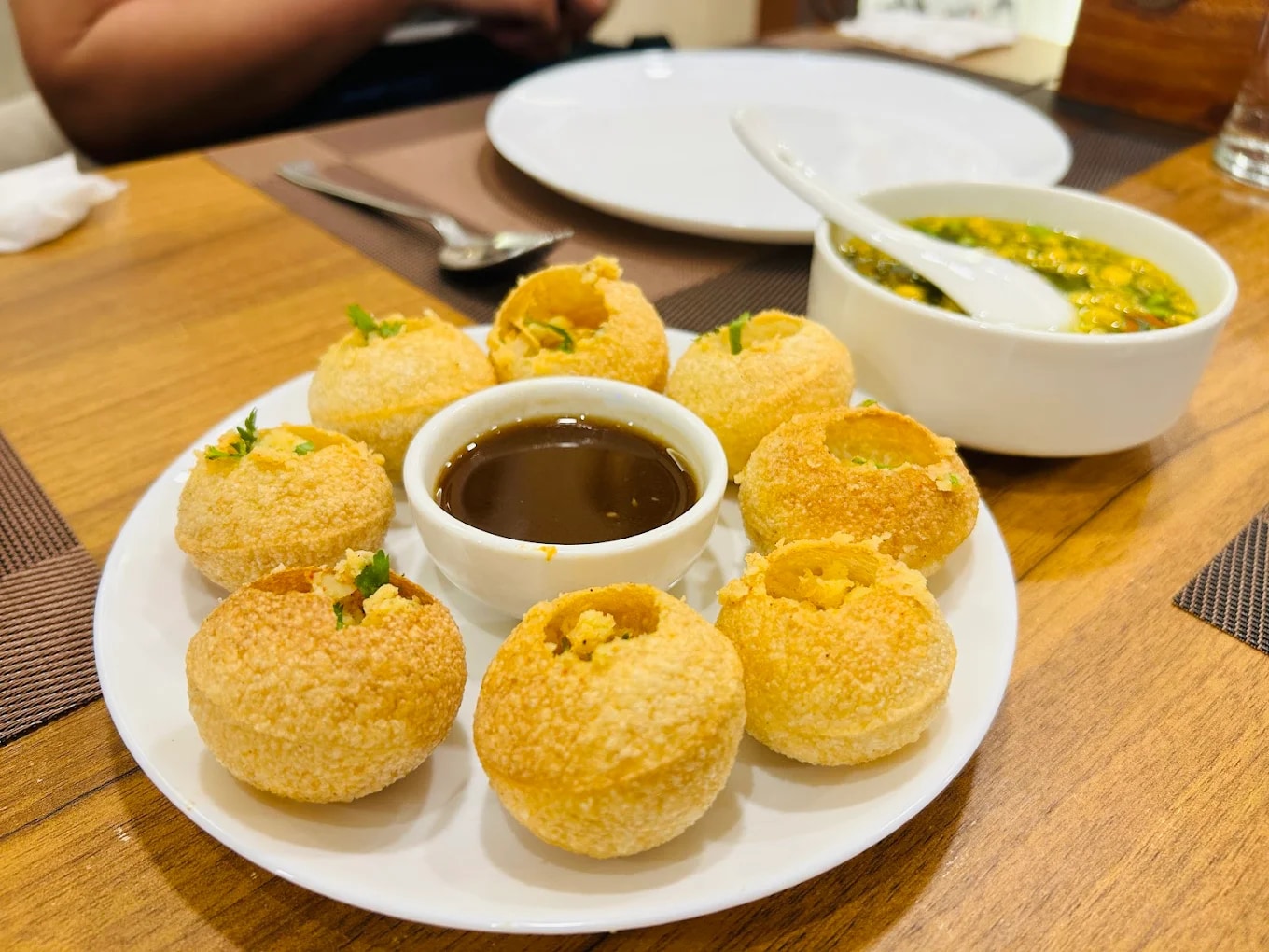 The Indian vegetarian menu includes bold-flavored favorites like dosa, paneer tikka, and biryani, full of authentic spices and aromas