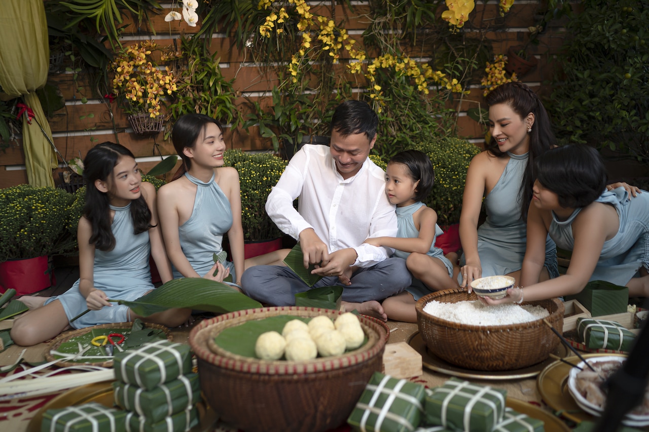 Chung cake serves as the centerpiece of Vietnamese ancestral altars during Tet, connecting families to their heritage and spiritual beliefs