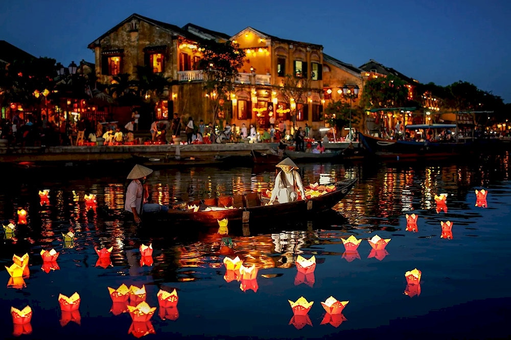 A must-do for a true Mid-Autumn experience is visiting Hoi An to light lanterns and float them on the water with wishes for good luck
