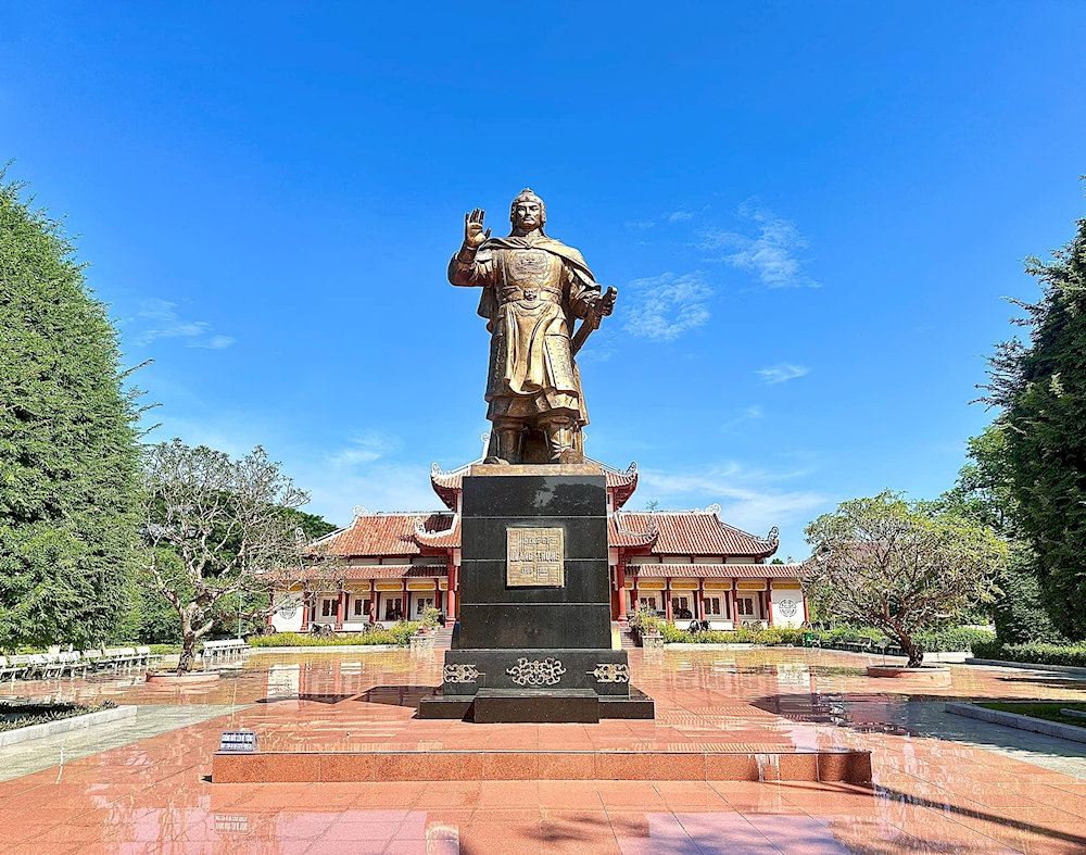 The statue of Emperor Quang Trung serves as a prominent symbol of national resilience and military genius 