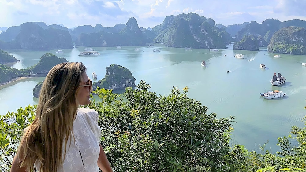 Visitors trek up Ti Top Mountain to admire the panoramic view of Ha Long Bay 