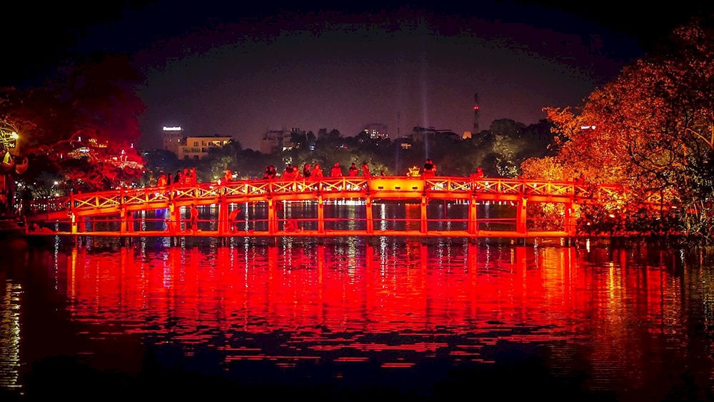 The Huc Bridge at night takes on a shimmering and magical beauty