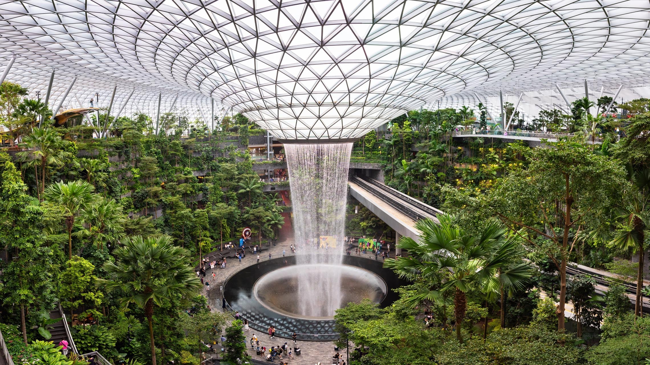 Rain Vortex, a 40-metre-high waterfall surrounded by lush greenery at Jewel Changi Airport in Singapore