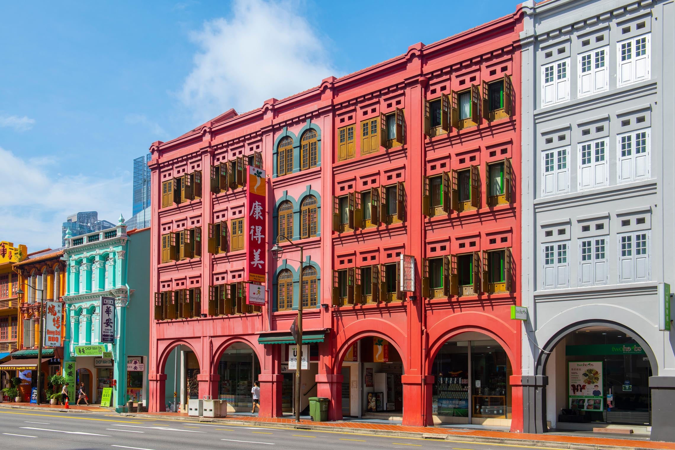 Historic shophouses and lively streets in Chinatown, Singapore, surrounded by hotels in Singapore and urban landmarks