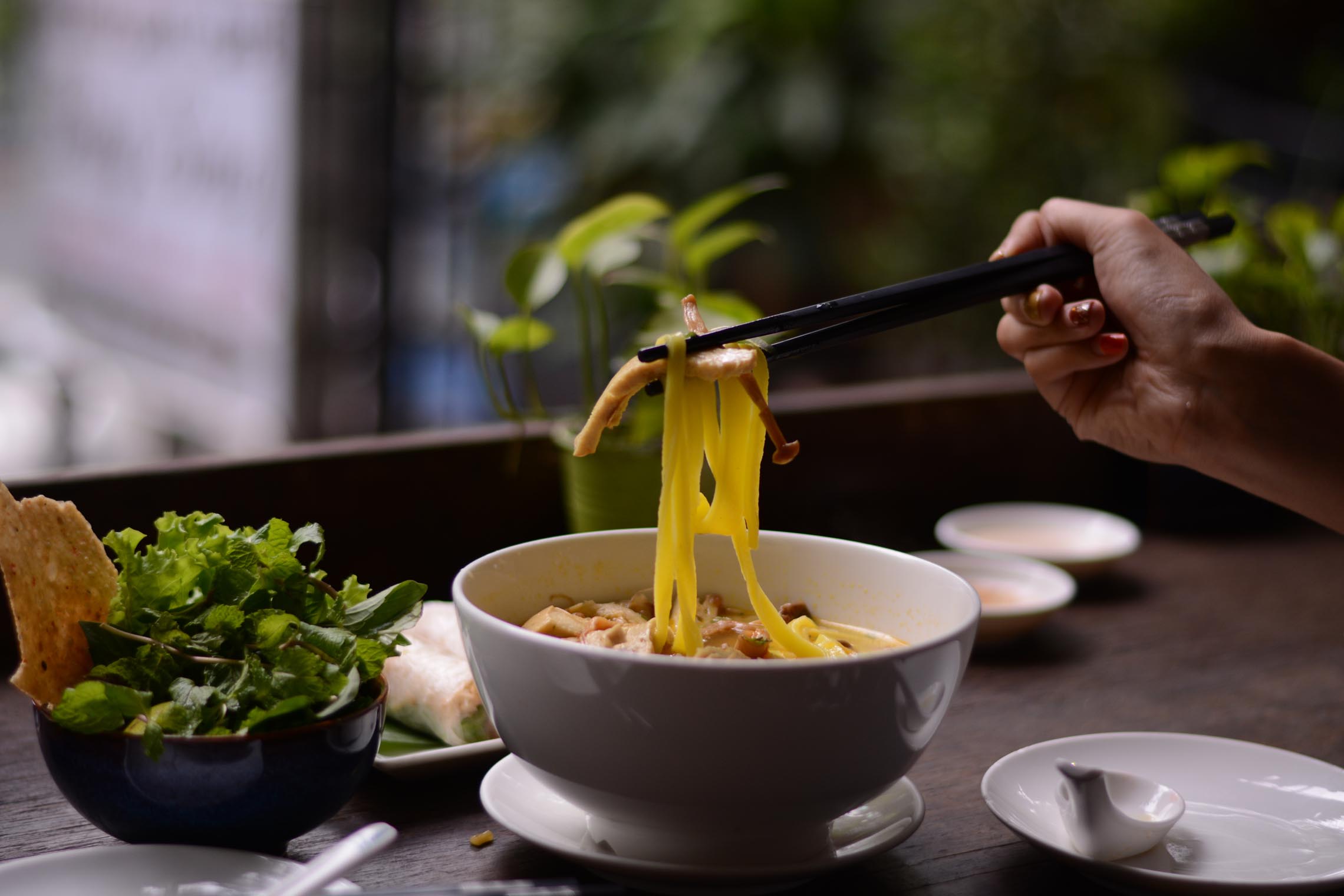 Flavorful Mi Quang, one of Da Nang's most beloved Central Vietnamese specialties, served at a Da Nang restaurant