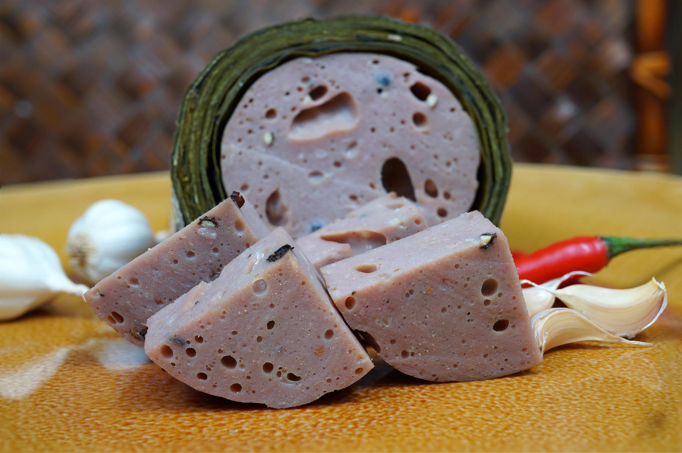 Authentic Da Nang Cha Bo (Beef sausage) displayed as a local gift at a specialty shop in Da Nang, Vietnam
