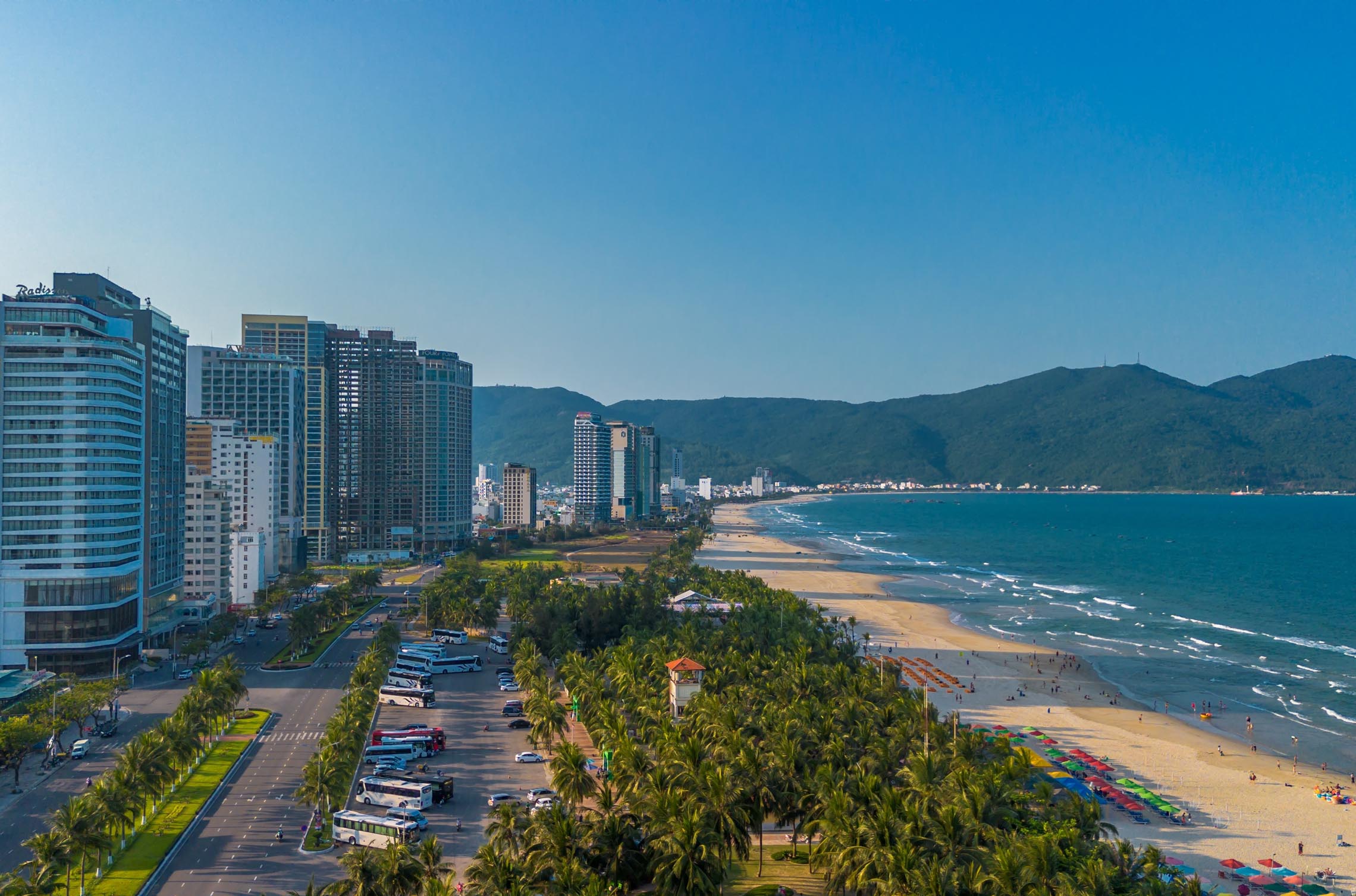 Aerial view of Da Nang hotels along the beachfront coastline with scenic ocean views in Da Nang, Vietnam