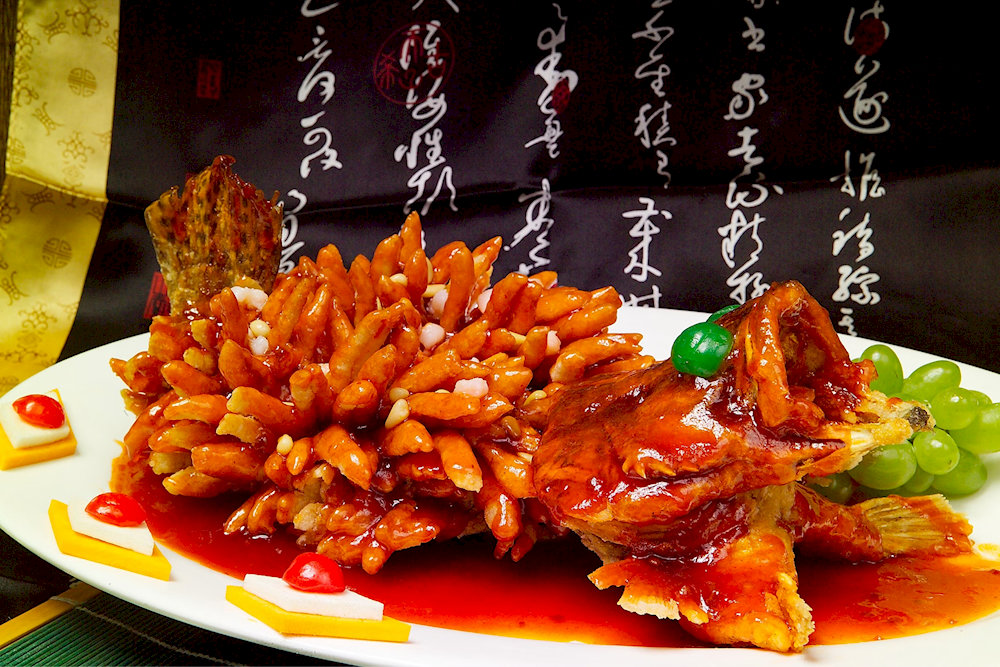 The fish fans out into a porcupine-like shape, making it as visually striking as it is flavorful