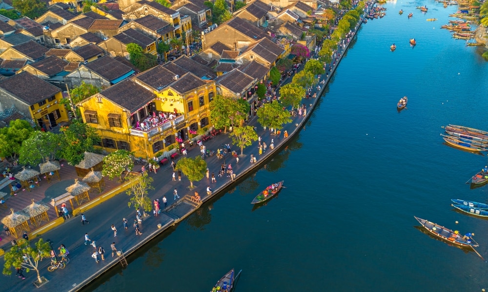 Aerial drone view of Hoi An city, Vietnam. Ancient town, UNESCO world heritage, at Quang Nam province. One of the most popular touristic destinations