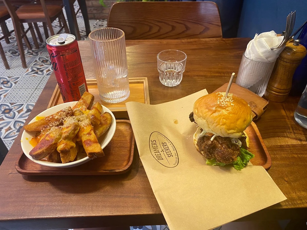 The House Burger at Dreamers & Seekers is very special with thick meat, balanced flavor, and beautiful presentation 