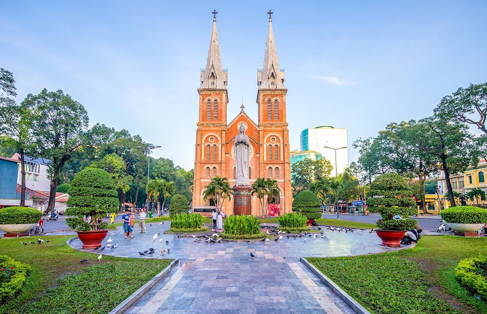 Saigon’s Notre-Dame Cathedral stands out with its French colonial architecture, symbolizing the city’s religious and cultural roots