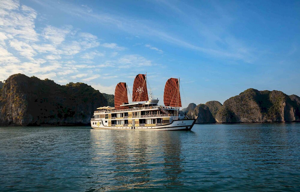 The day begins with sunrise Tai Chi and a visit to Titop Island, known for its charming beach and panoramic view